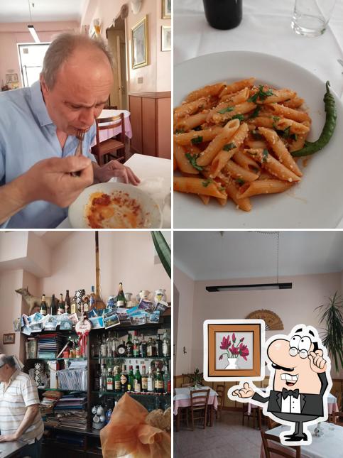 La foto di interni e cibo da Trattoria Affittacamere Paolucci