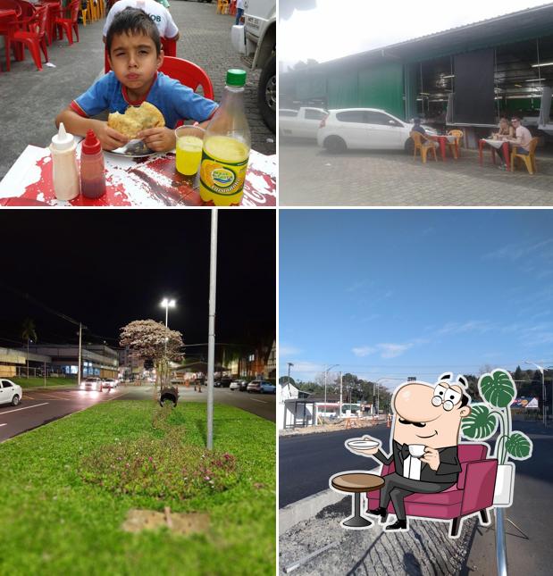 A imagem da interior e exterior no Pastelaria Carmem