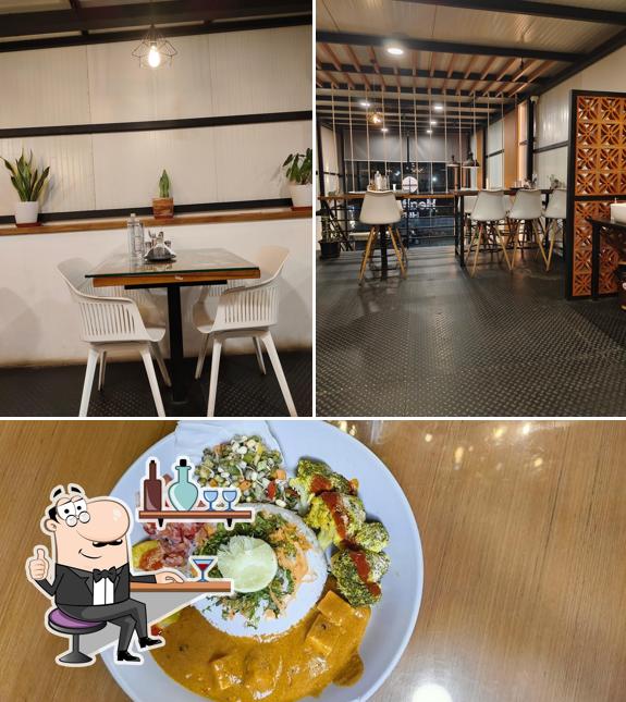 Take a seat at one of the tables at Healthy Hut