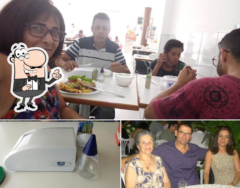 A imagem do Restaurante Dona Myrtes’s interior e bebida