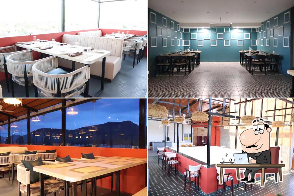 Check out how PNS NAKSHATRA - CLOUD NINE - ROOF TOP - MULTICUISINE RESTAURANT looks inside