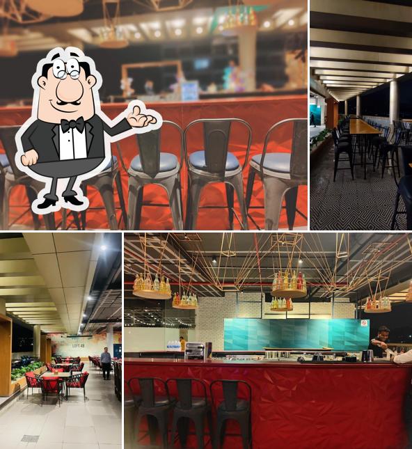 Take a seat at one of the tables at Loft On The Top