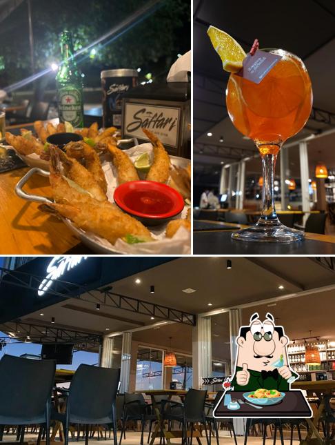 A ilustração da comida e interior no Saffari eat and drink