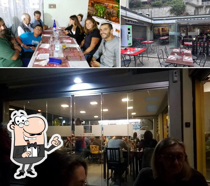 Siediti a un tavolo di Le pizze di Koppa
