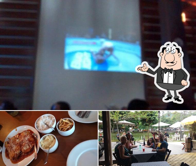 Sente em uma das mesas no Casa da Picanha