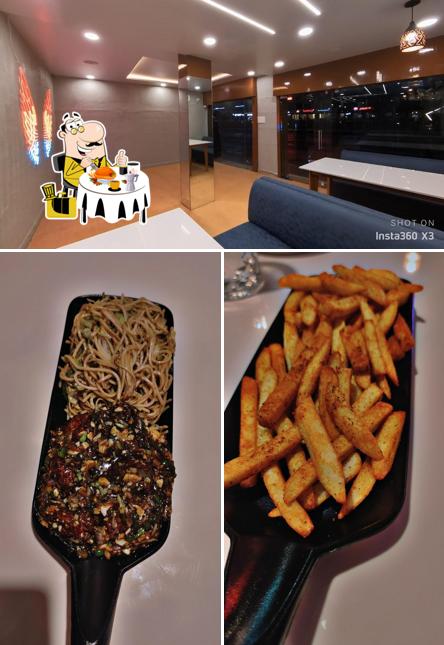 Check out the picture showing food and interior at THE SECRET BITE