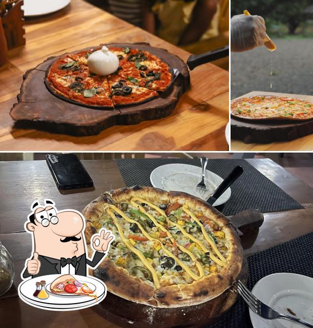 At ND’s MANGO Restaurant - Vapi, you can try pizza