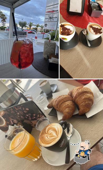 Guarda la immagine che raffigura la cibo e interni di La Terrazza Caffè & Tabacchi