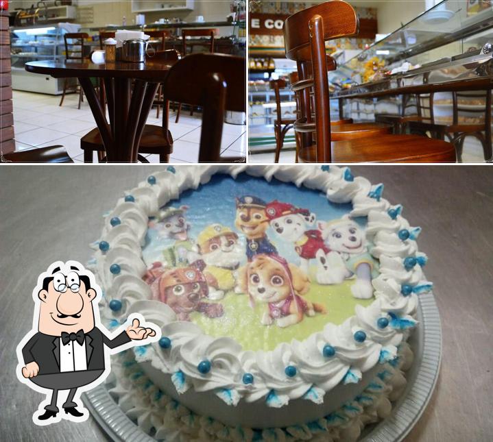 Esta é a foto apresentando interior e bolo no Padaria e Confeitaria Amore Mio