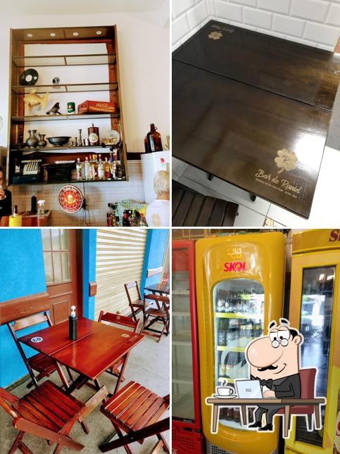 Sente em uma das mesas no Bar do Raniel