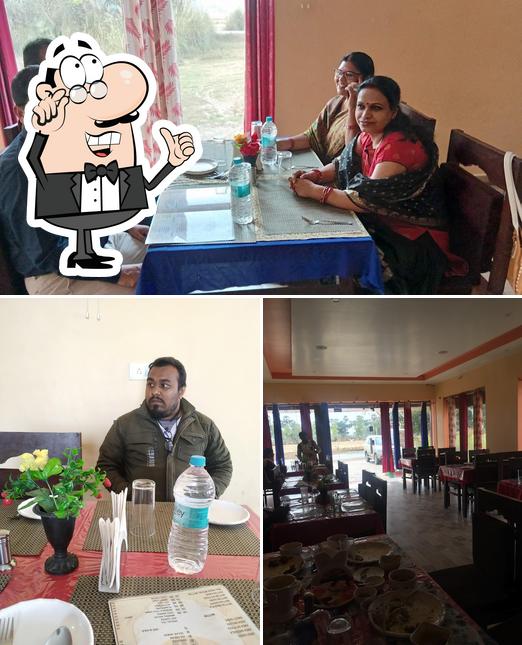 Take a seat at one of the tables at Raj Rasoi, Nima Morr, Daudnagar