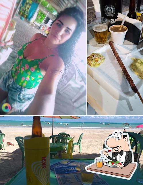 Dê uma olhada a ilustração mostrando comida e cerveja a Restaurante Lua Cheia