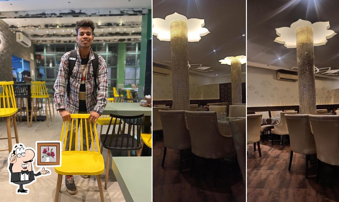 Take a seat at one of the tables at Gokul Restaurant