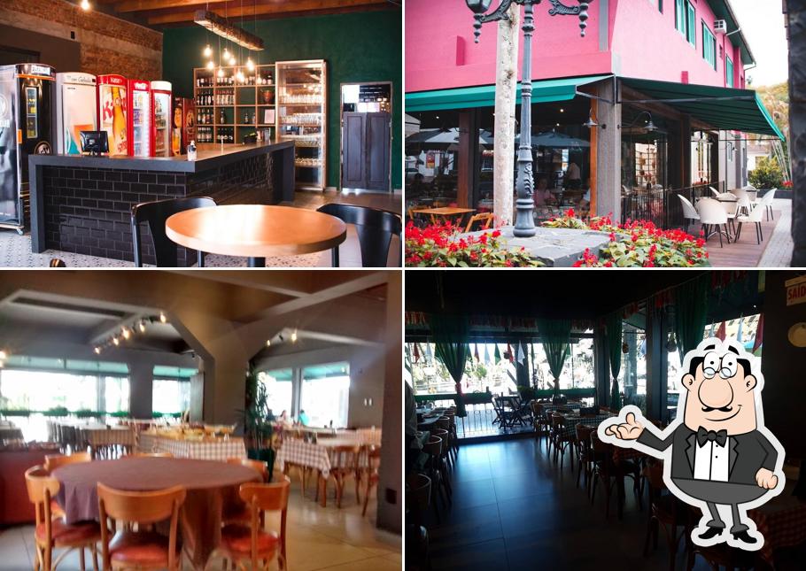 Sente em uma das mesas no Restaurante Veneza