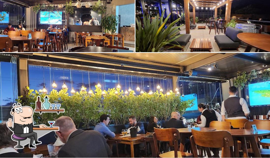 Veja imagens do interior do Bodega Pizza Entre Vinhos