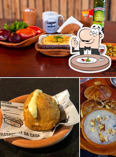 Entre diversos coisas, comida e cerveja podem ser encontrados no Cantinho da Macaxeira - Gastro Bar e Restaurante de Comida Regional em Garanhuns