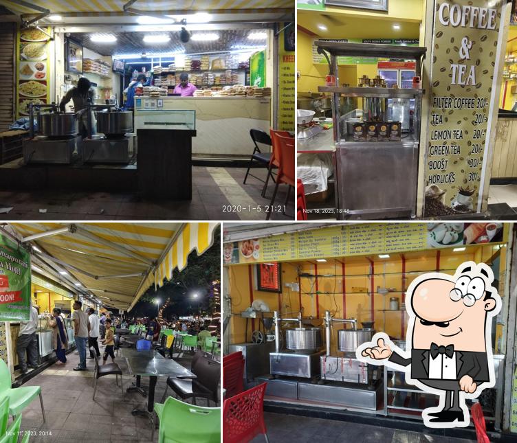 The interior of Om Shiv Shakthi Murugan Idli Dosa Center