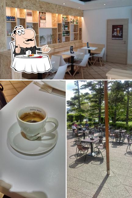 Tra le diverse cose da OASIS Sports Bar si possono trovare la tavolo da pranzo e bevanda