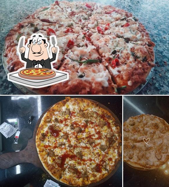 Try out pizza at The Hunger Game and Cafe