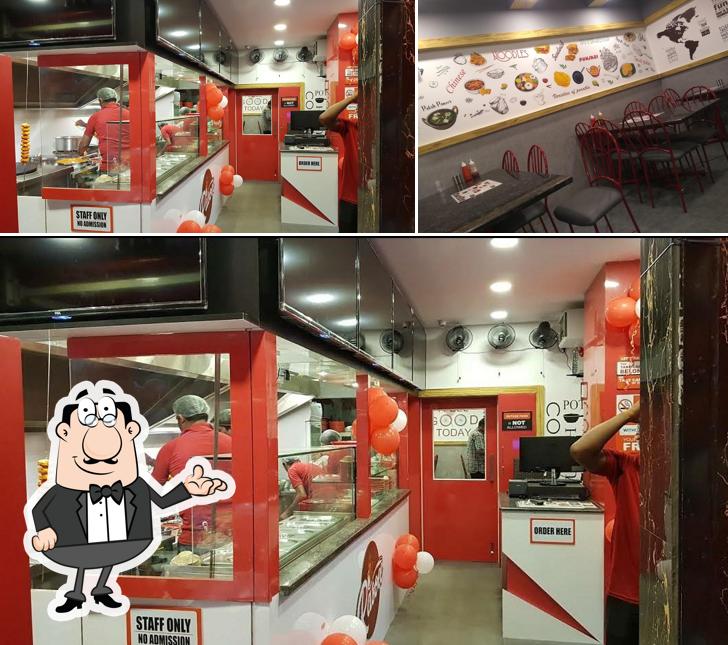 Take a seat at one of the tables at Rasoee