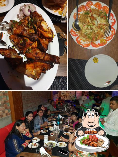 Among different things one can find food and dining table at The Brewmaster-Beer Factory Batala