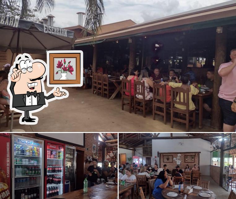 Sente em uma das mesas no Restaurante da Estiva