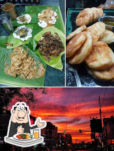 The photo of food and exterior at Muthukumar Bun parotta kadai . keezha vasal