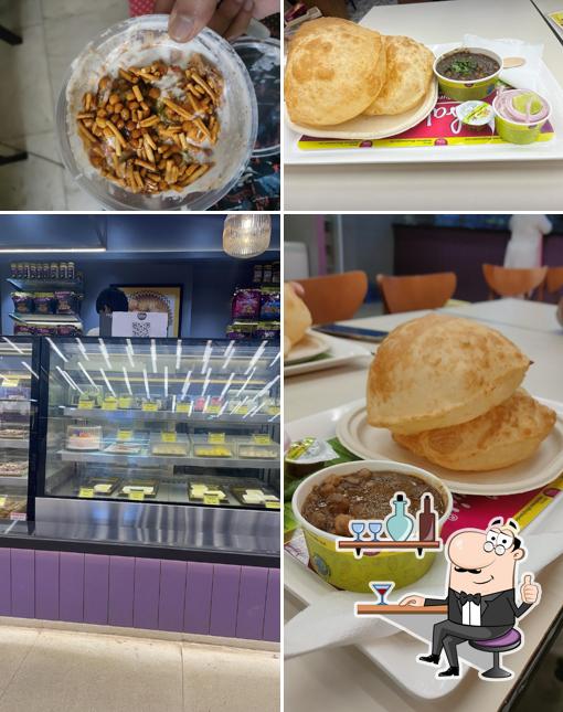 Take a seat at one of the tables at Prabhuji pure food