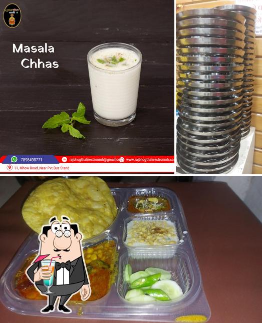 RAJBHOG THALI is distinguished by drink and food