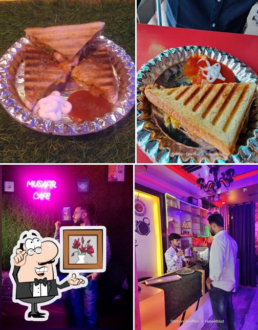 Take a look at the image depicting interior and food at मुसाफिर कैफ़े