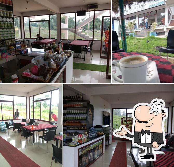Take a seat at one of the tables at The Malnad Cafe and Eco Stay