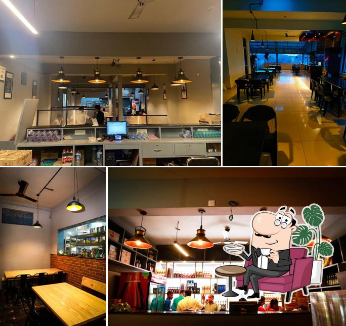 Take a seat at one of the tables at Rummy's Resto Bar