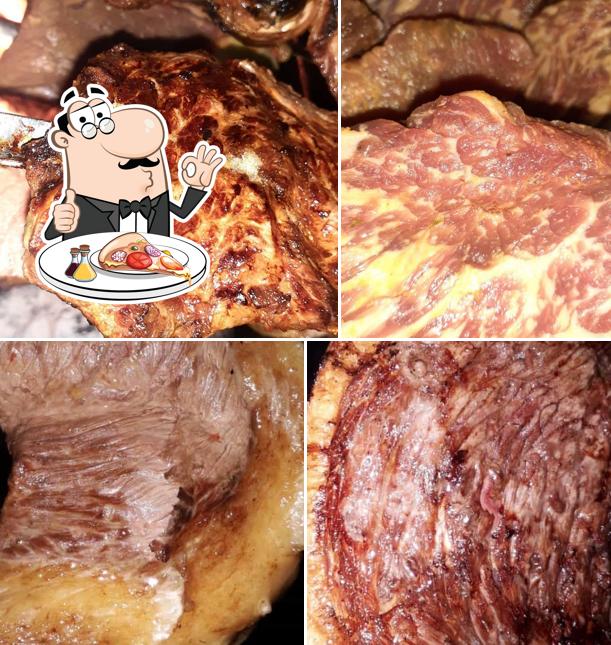 Experimente pizza no Churrascaria Hildo Bar