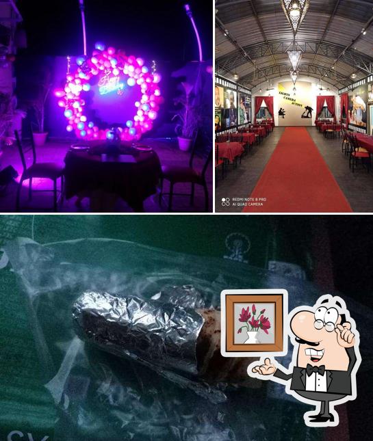 Check out the image showing interior and food at Box office restro and cafe