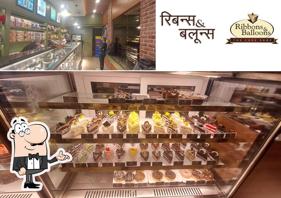 Check out how Ribbons and Balloons - The Cake Shop looks inside