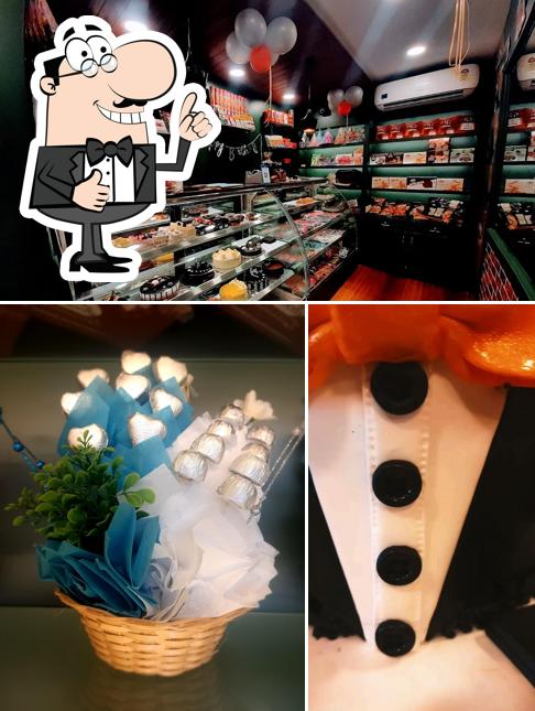 See the picture of Ribbons & Balloons The Cake Shop