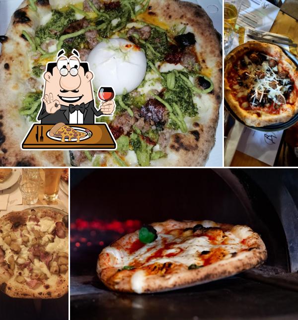 A Pizzeria Al Campanile, puoi assaggiare una bella pizza