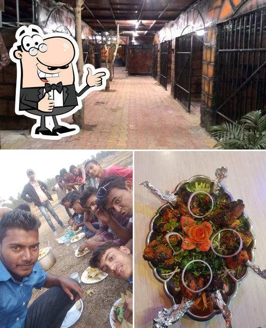 Look at the photo of Trupti Veg & Non-Veg Restaurant