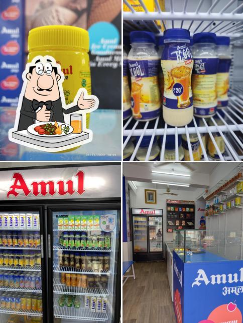 Check out the photo depicting food and interior at Modi Enterprises - Amul's Authorised Preferred Outlet (APO) - Ice Cream & Milk Parlour