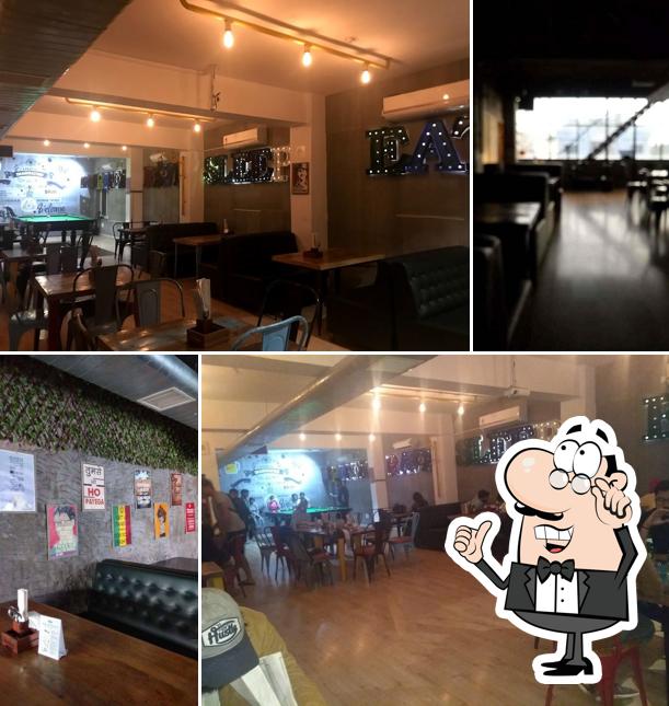 Take a seat at one of the tables at Up & Above