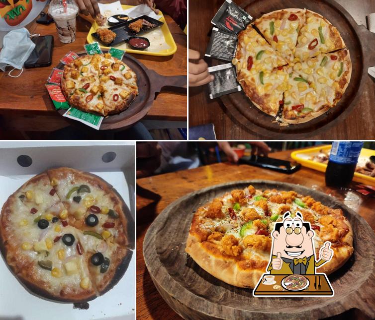 Try out pizza at Crispy's fried chicken and cafe (CFC)