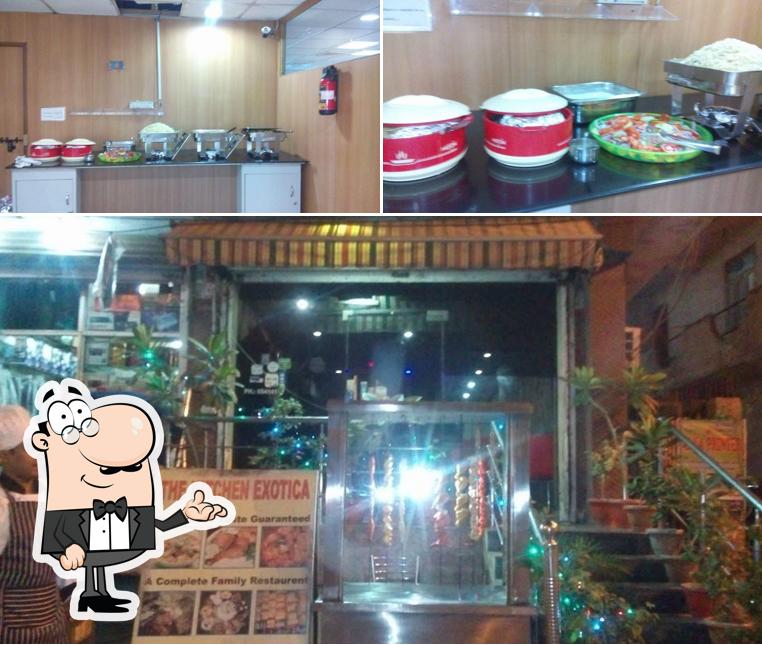 Take a look at the picture depicting interior and food at The Kitchen Exotica