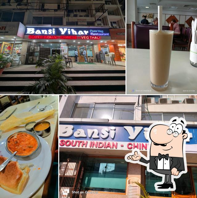 Take a seat at one of the tables at Bansi Vihar Restaurant