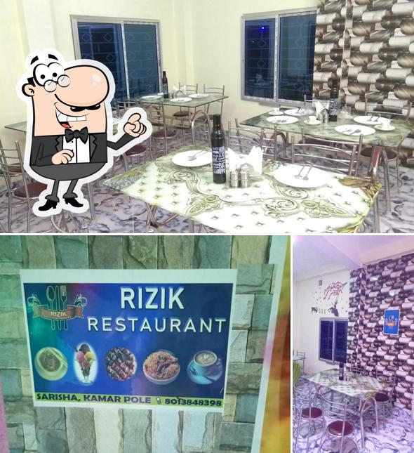 Take a seat at one of the tables at Rizik restaurant