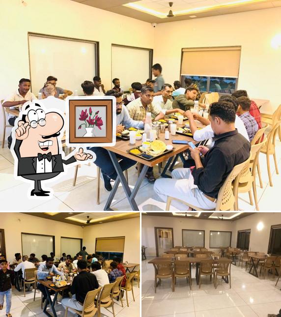 The interior of KANHA GARDEN RESTAURANT - Vegetarian Restaurant Pure Veg Jain Food