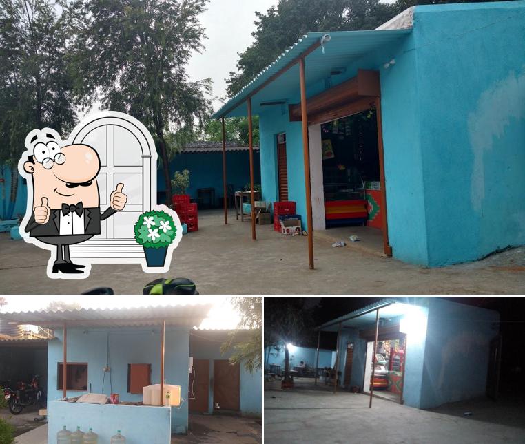 Check out the photo displaying exterior and interior at Chhotu Dhaba