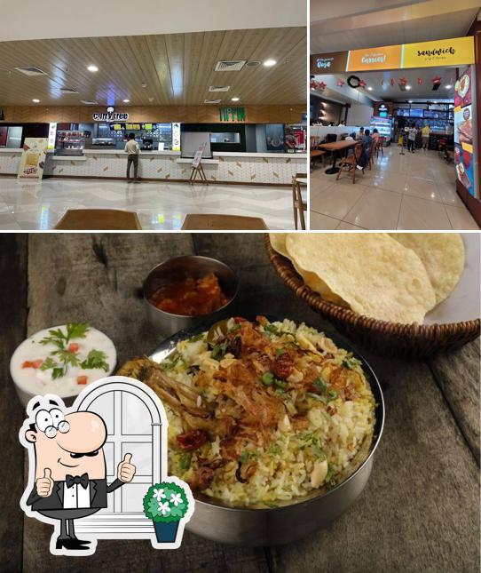 The photo of Curry Tree Diner by CAFS’s exterior and food