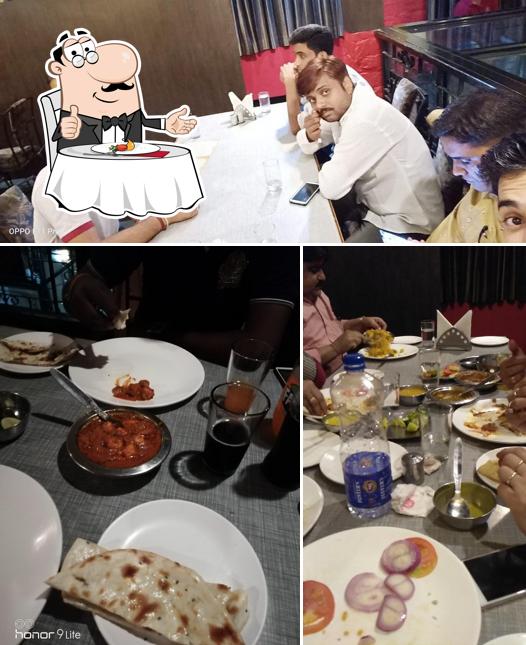 The picture of dining table and interior at Jayshree Ki Rasoi