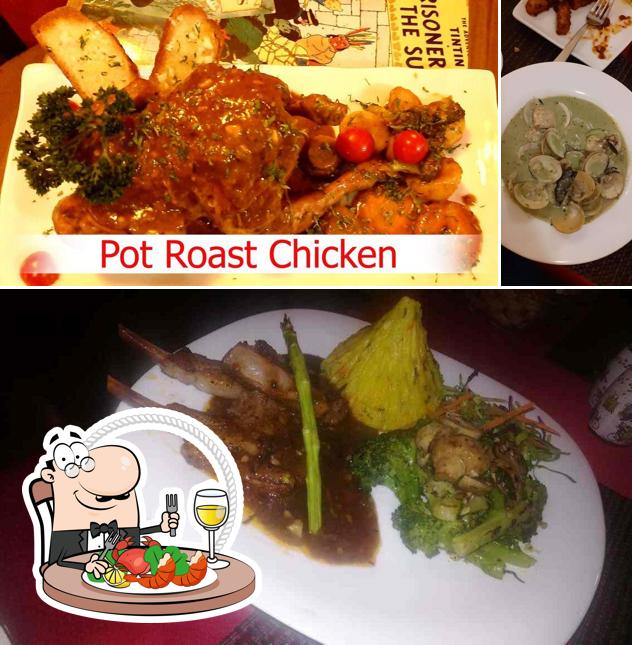 Try out different seafood meals available at Tintin & The Brussels Club