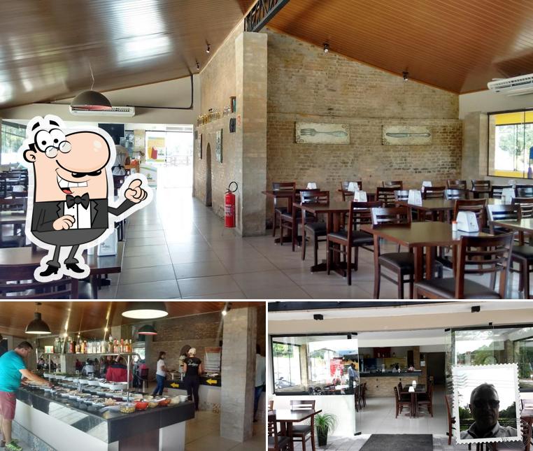 Sente em uma das mesas no Restaurante Alentejano